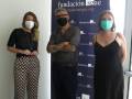 Tres personas posan frente a un cartel de la Fundación SGAE, con mascarillas protectoras.