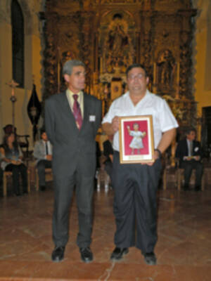 Provincia.El Profesor e Historiador D. Manuel Morales Morales, pronuncio una disertación, sobre el canto de la Sentencia de Pilatos en la Hermandad de Jesús Nazareno de Alcalá del Río.