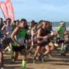La chipionera Eva Tirado y el roteño Manuel Gatón campeones absolutos de la vigésima edición de la carrera Playa de Regla.