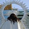 La Virgen del Carmen del Puente de Triana vuelve a surcar el Guadalquivir en una de las grandes estampas de la devoción marinera sevillana