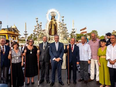 La Virgen del Carmen de Triana navega por el Guadalquivir en una jornada de profunda tradición marinera en Sevilla 
